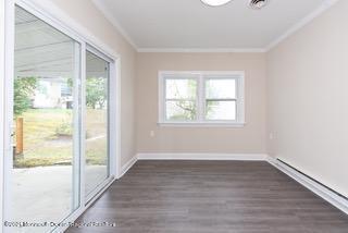 6 Churchill Road Whiting, NJ 08759 - Photo 22 of 30 a view of an empty room with wooden floor and a window