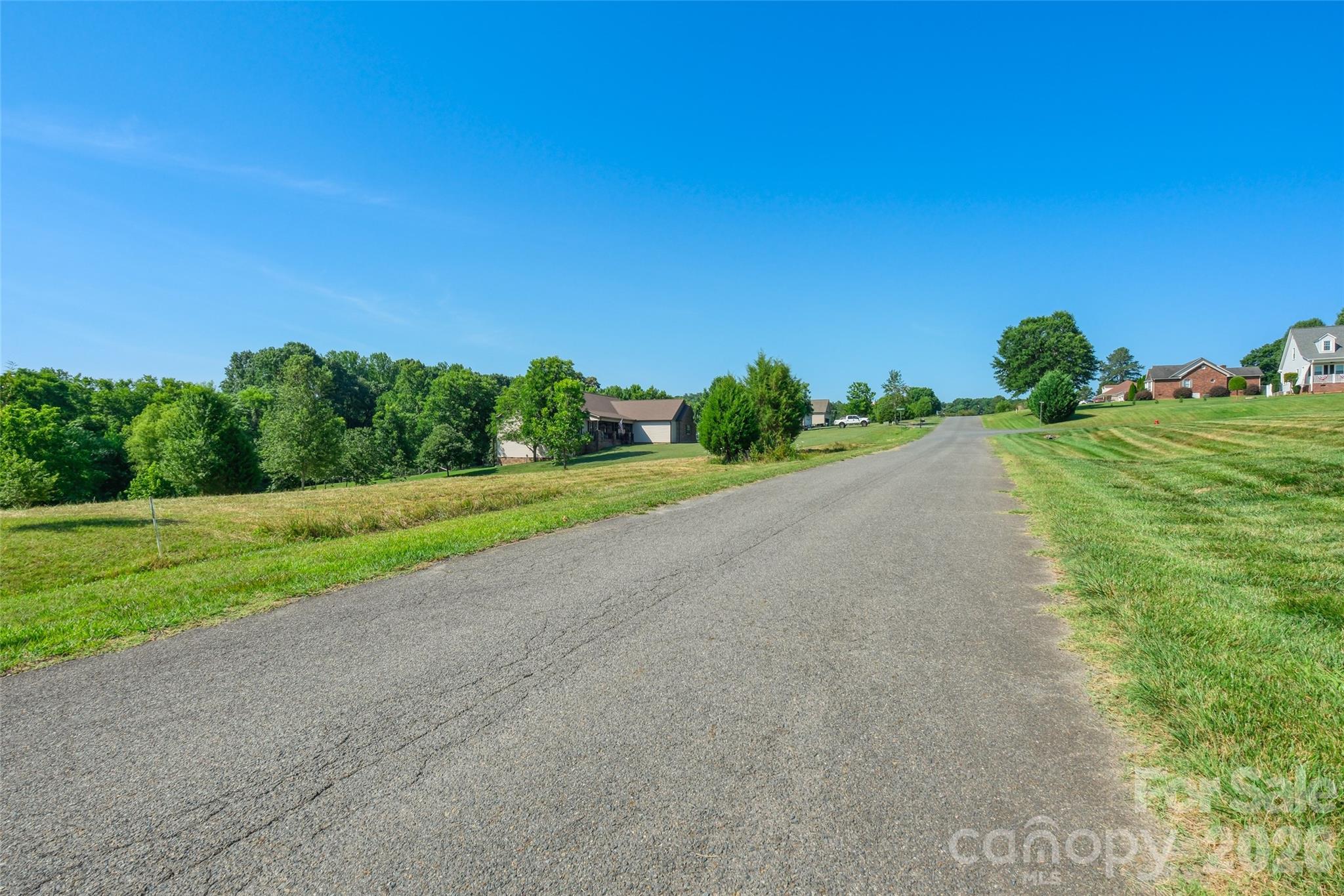 Lot 3 Crepts Branch Road, Unit 3 Locust, NC 28097 - Photo 14 of 36 a view of a road with a big yard