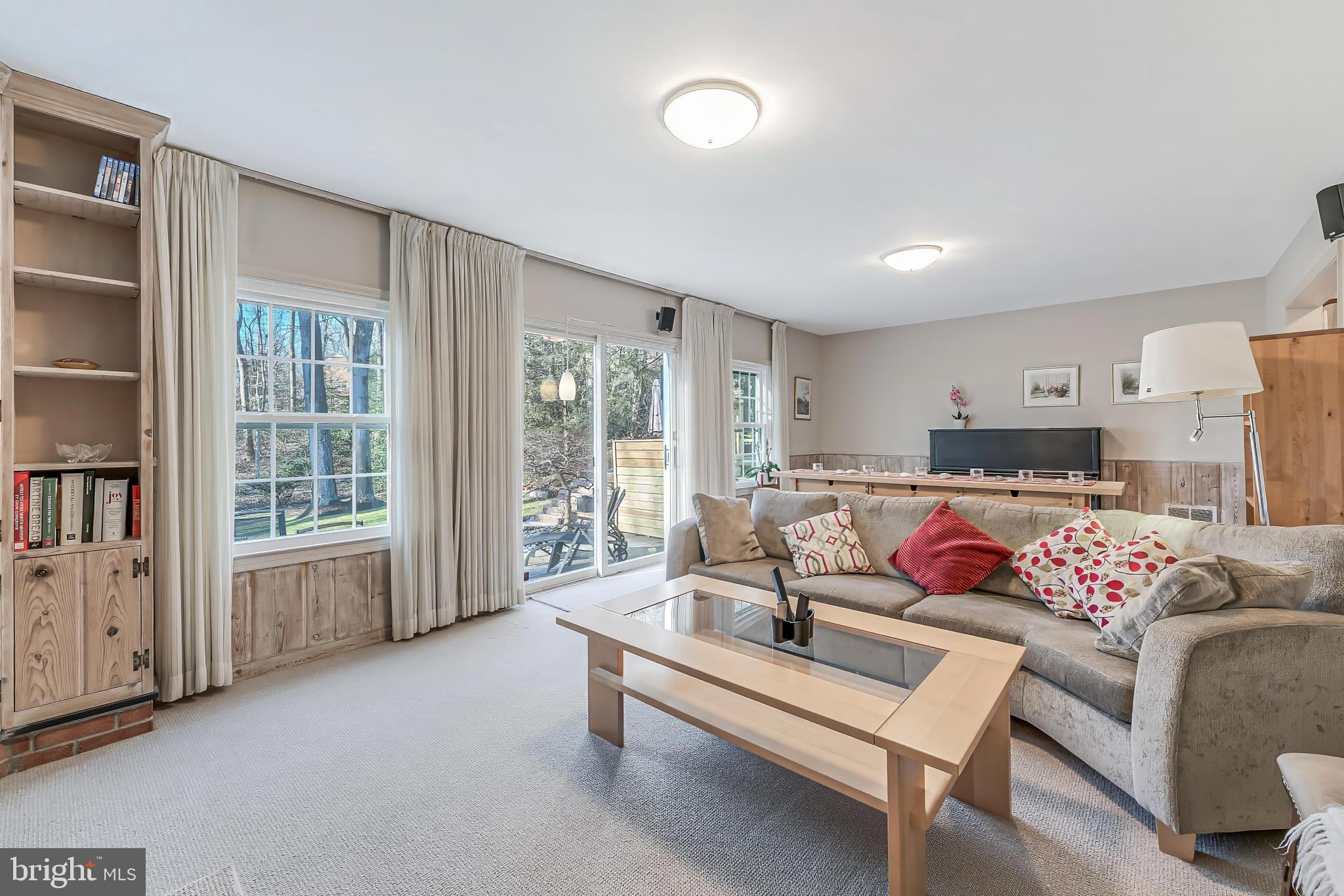 9908 Carter Road Bethesda, MD 20817 - Photo 19 of 51 First lower level - bright & airy family room