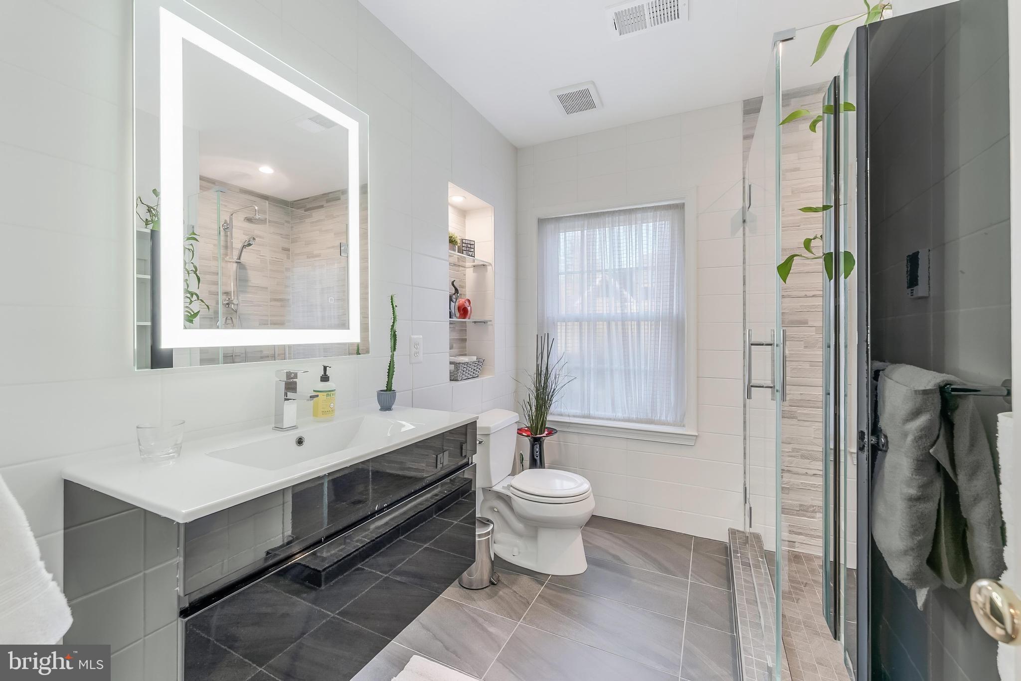 9908 Carter Road Bethesda, MD 20817 - Photo 32 of 51 Stunning remodeled bathroom on first-lower level