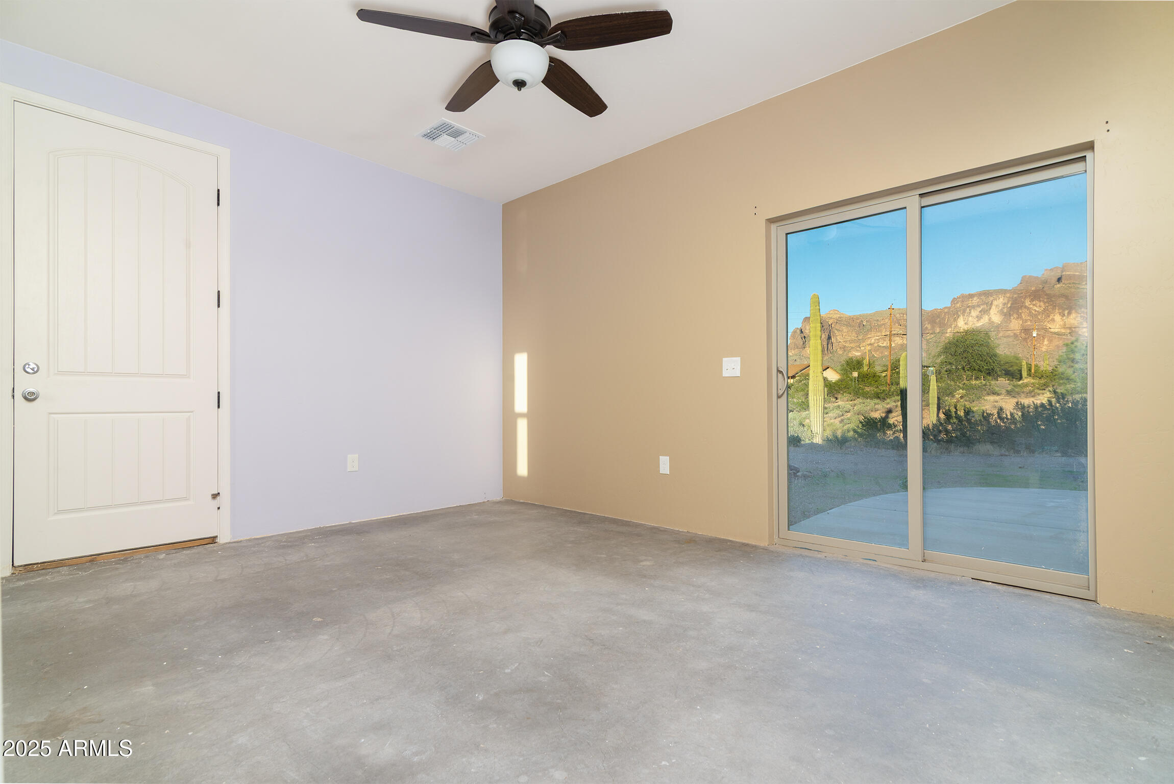 4129 East Roundup Street Apache Junction, AZ 85119 - Photo 15 of 42 a view of an empty room with glass door