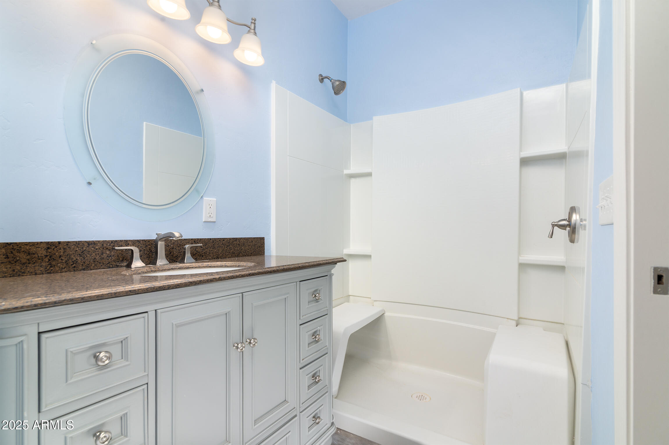 4129 East Roundup Street Apache Junction, AZ 85119 - Photo 17 of 42 a bathroom with a sink a toilet and a mirror