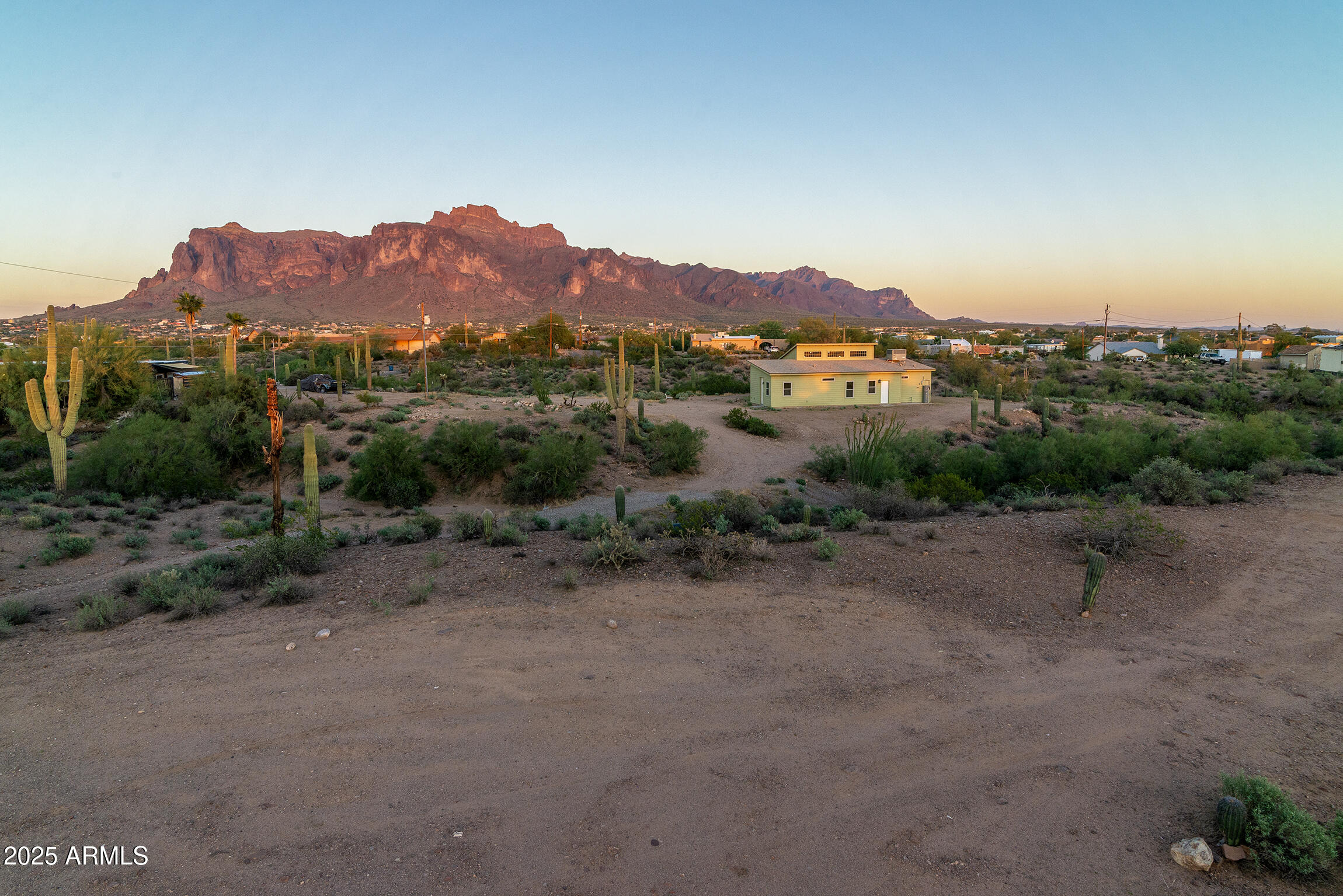 4129 East Roundup Street Apache Junction, AZ 85119 - Photo 2 of 42 a view of a lake with a mountain in the background
