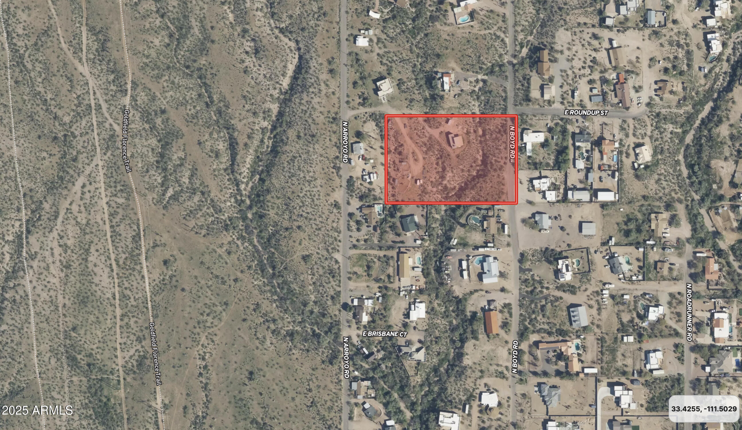 4129 East Roundup Street Apache Junction, AZ 85119 - Photo 24 of 42 a sign that is on a brick wall