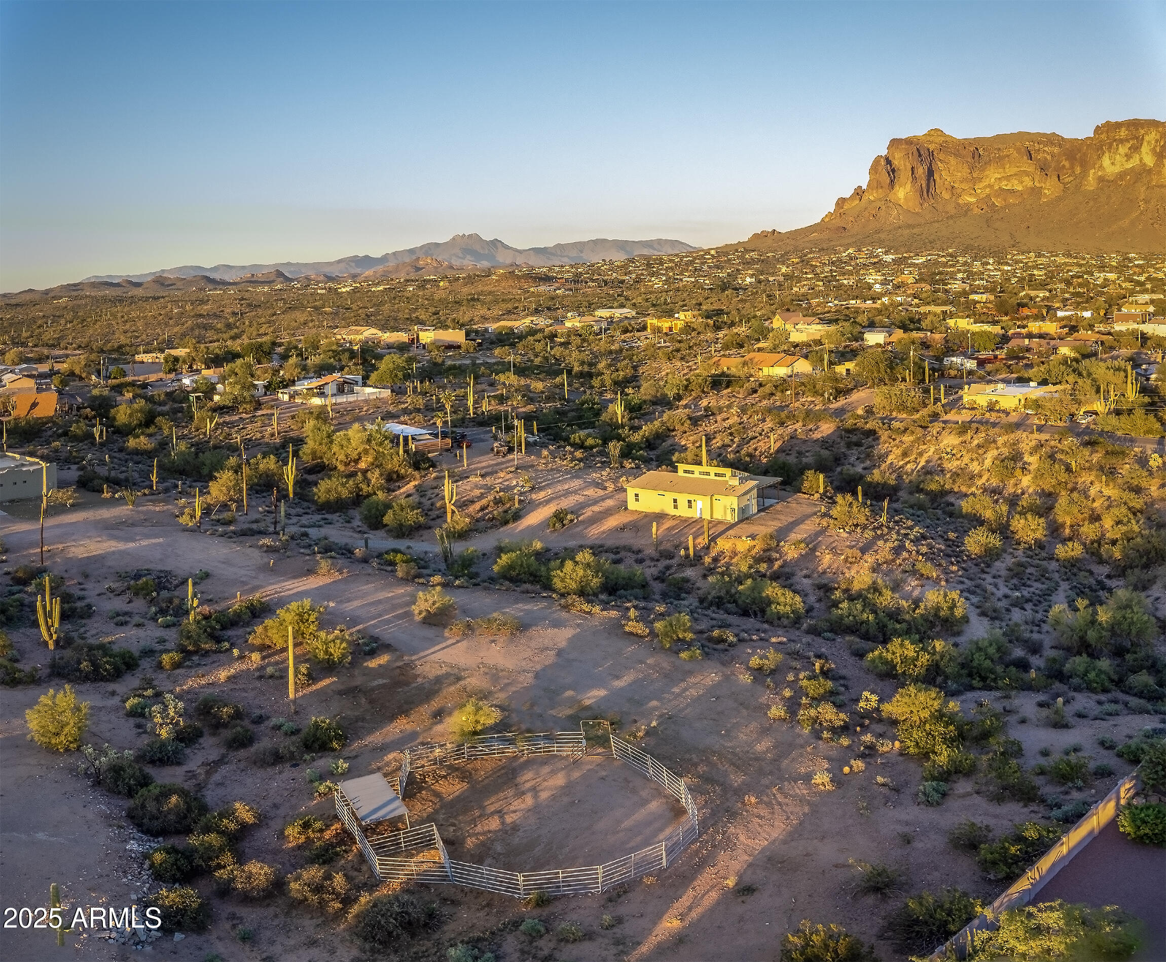 4129 East Roundup Street Apache Junction, AZ 85119 - Photo 27 of 42 an aerial view of residential houses with outdoor space