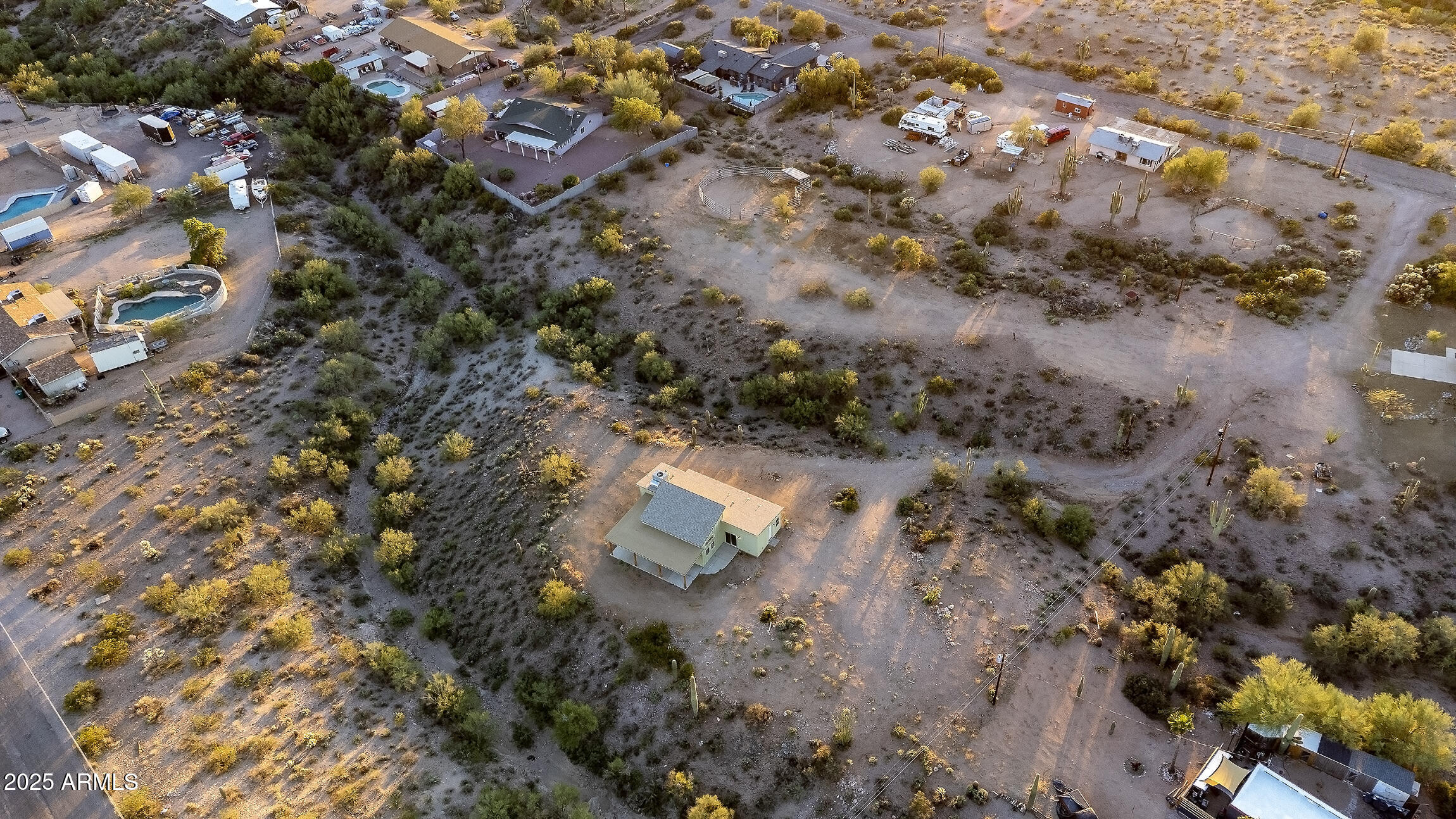 4129 East Roundup Street Apache Junction, AZ 85119 - Photo 30 of 42 an aerial view of residential house with outdoor space