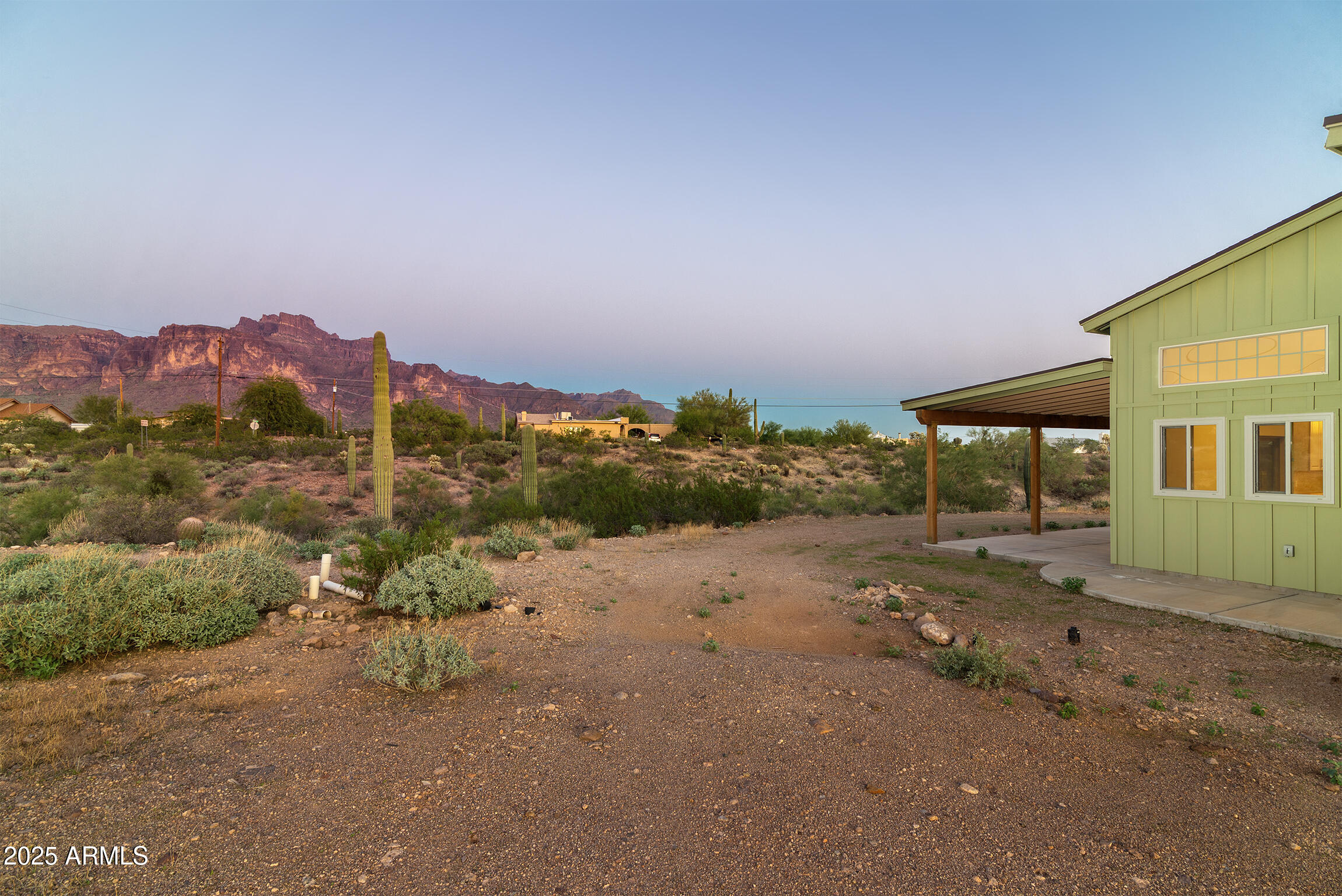 4129 East Roundup Street Apache Junction, AZ 85119 - Photo 40 of 42 a view of a road with a building in the background