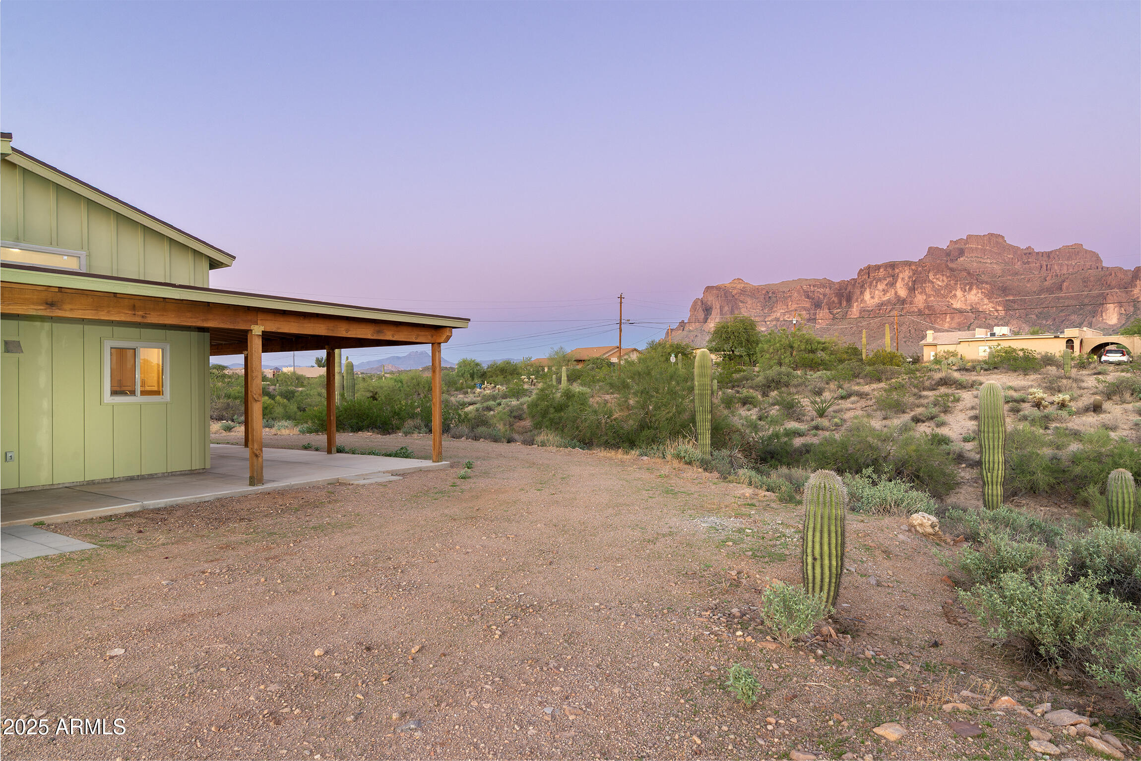 4129 East Roundup Street Apache Junction, AZ 85119 - Photo 5 of 42 a view of a house with a street