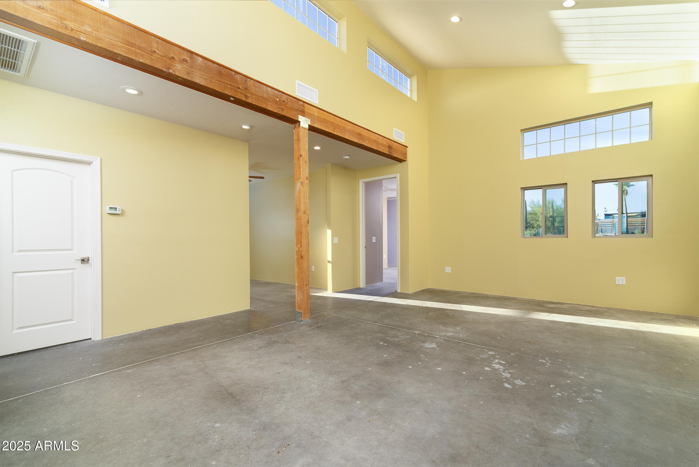 4129 East Roundup Street Apache Junction, AZ 85119 - Photo 10 of 42 a view of an empty room with a window