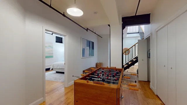 a kitchen with stainless steel appliances granite countertop a stove and a refrigerator