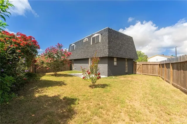 a front view of house with yard