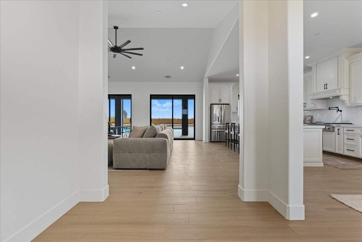 605 South Anderson Road Exeter, CA 93221 - Photo 14 of 81 a living room with furniture and a view of kitchen
