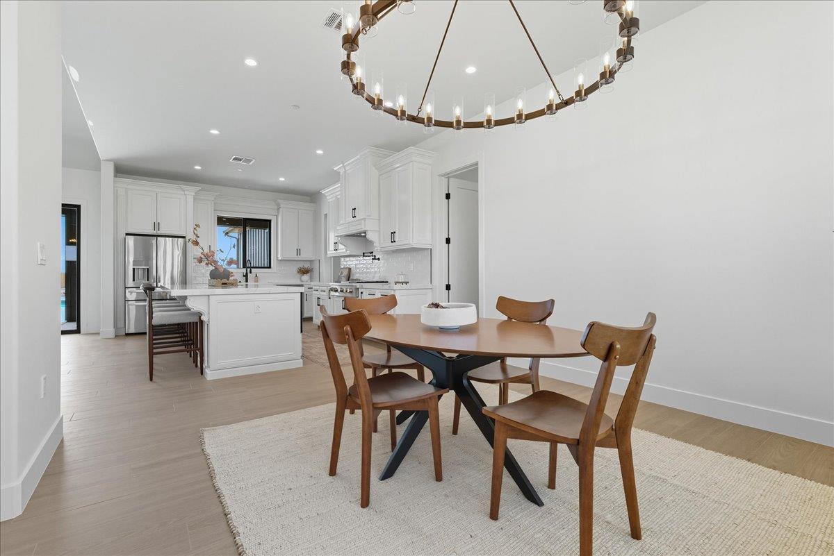 605 South Anderson Road Exeter, CA 93221 - Photo 17 of 81 a view of a dining room with furniture