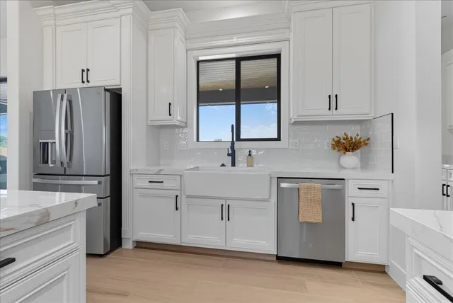 a bathroom with a double vanity sink and a mirror
