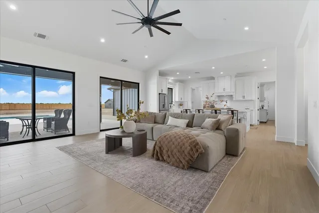 a view of an empty room with a bathroom