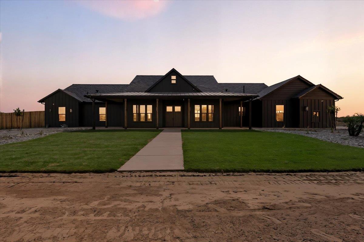 605 South Anderson Road Exeter, CA 93221 - Photo 3 of 81 a front view of a house with a garden