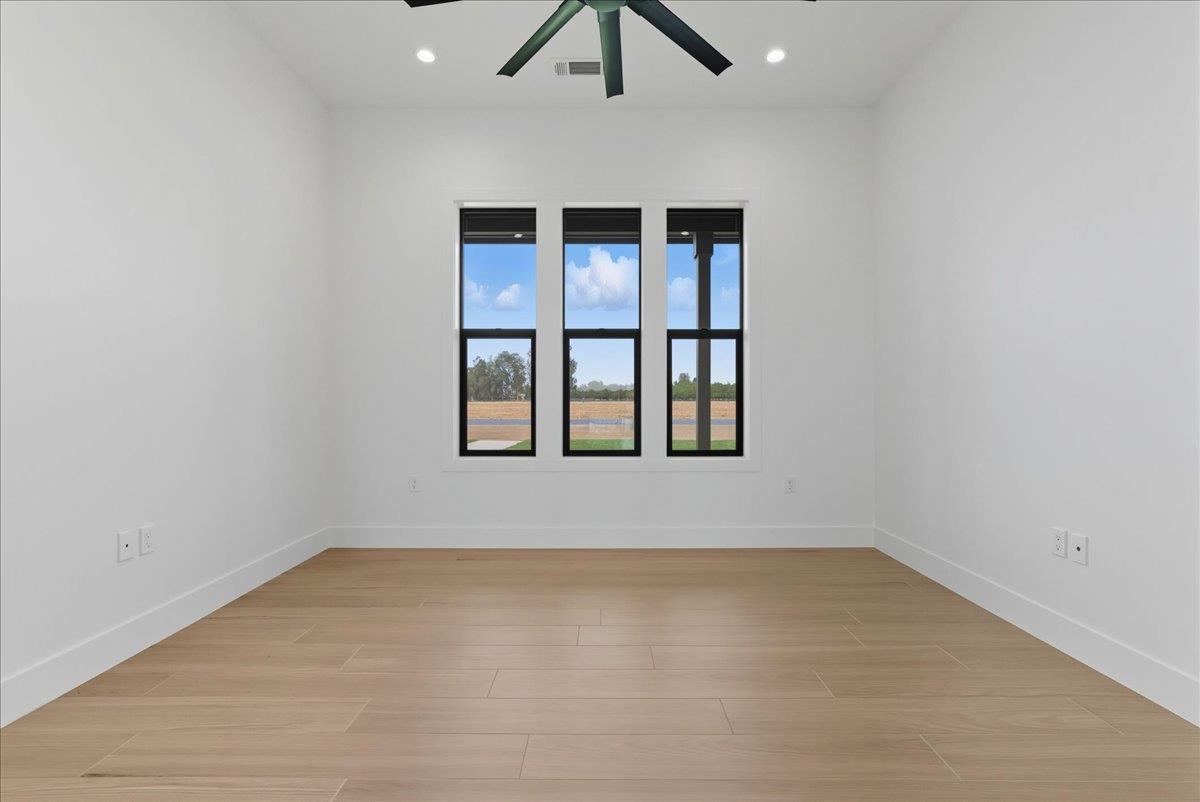 605 South Anderson Road Exeter, CA 93221 - Photo 33 of 81 a view of an empty room with a window