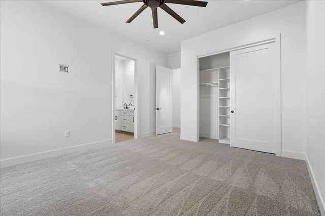 a spacious bathroom with a double vanity sink mirror and
