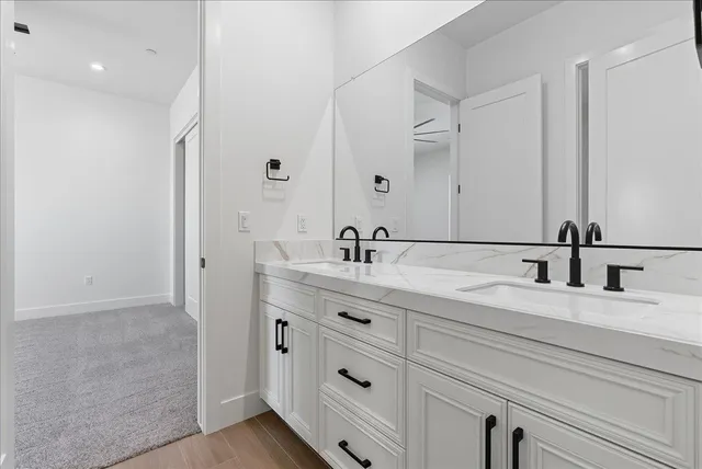 a bathroom with a bathtub and shower