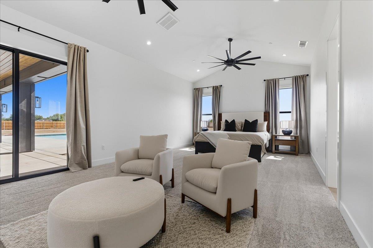 605 South Anderson Road Exeter, CA 93221 - Photo 48 of 81 a living room with furniture a ceiling fan and a rug