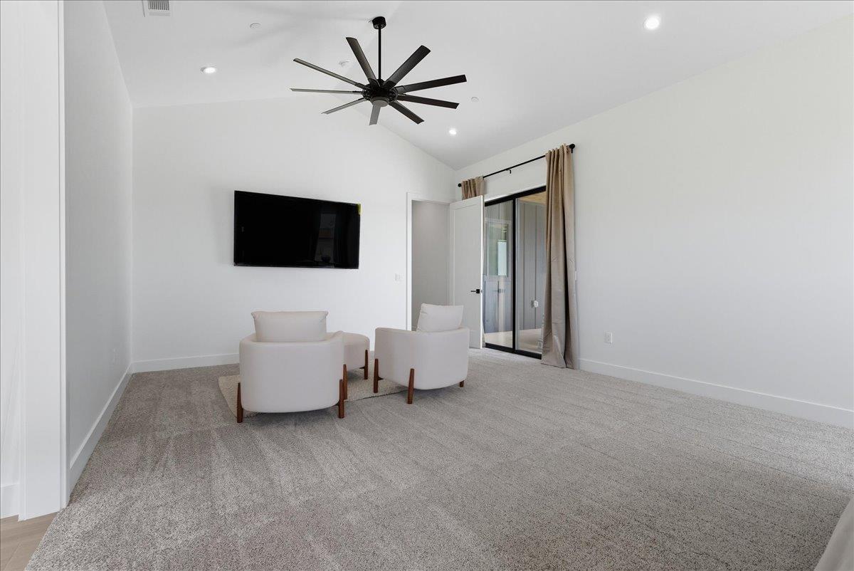 605 South Anderson Road Exeter, CA 93221 - Photo 49 of 81 a living room with furniture and a flat screen tv