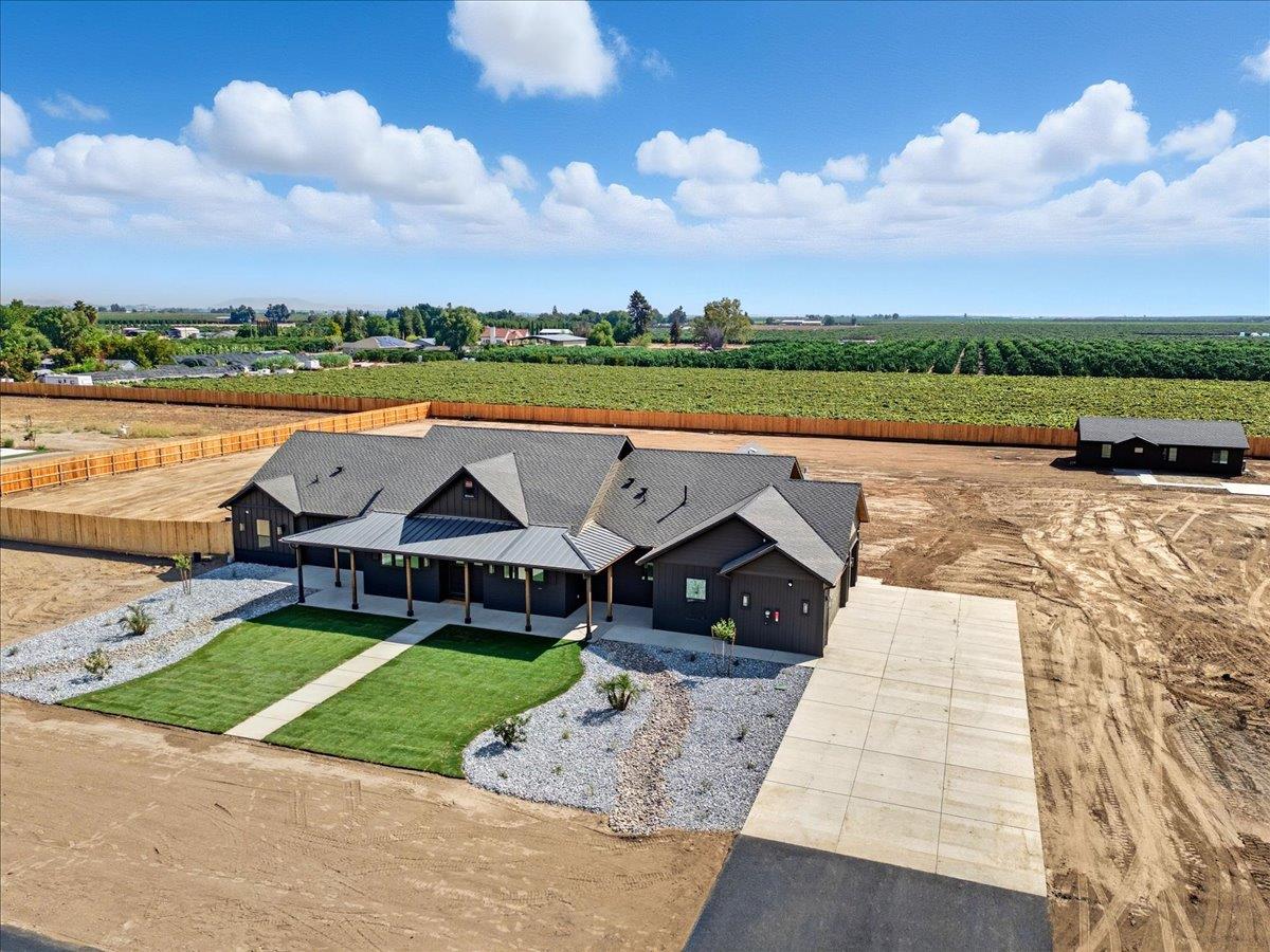 605 South Anderson Road Exeter, CA 93221 - Photo 9 of 81 an aerial view of a house with a lake view