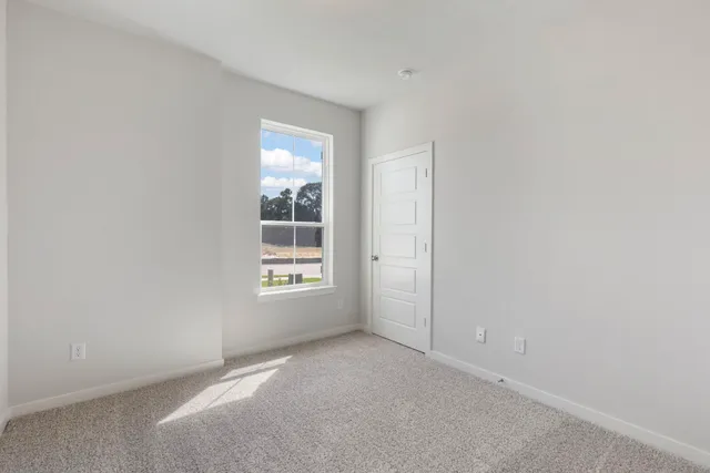 an empty room with windows