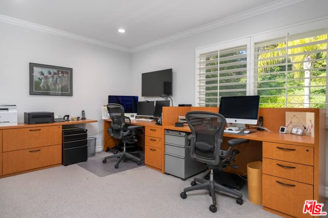 3104 Hutton Drive Beverly Hills, CA 90210 - Photo 27 of 37 a view of a workspace with furniture and a window