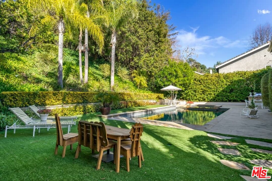 3104 Hutton Drive Beverly Hills, CA 90210 - Photo 28 of 37 a view of a chairs and table in patio