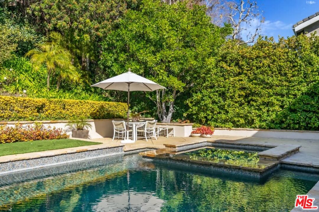 3104 Hutton Drive Beverly Hills, CA 90210 - Photo 29 of 37 a view of house with backyard outdoor seating and lake view