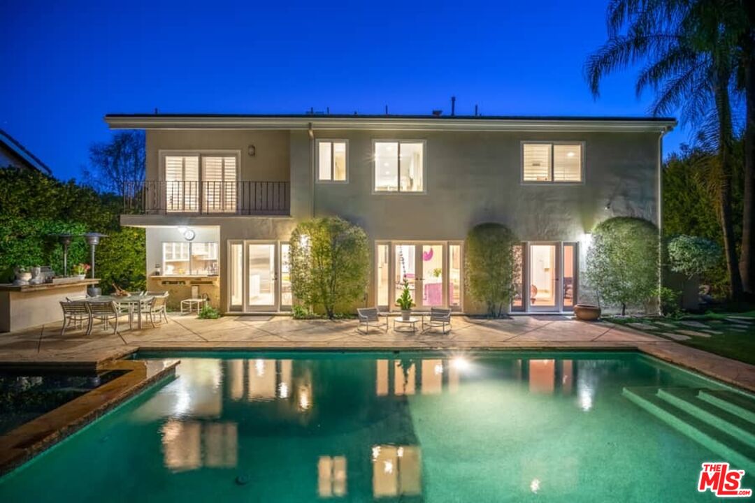 3104 Hutton Drive Beverly Hills, CA 90210 - Photo 34 of 37 a front view of a house with swimming pool and patio