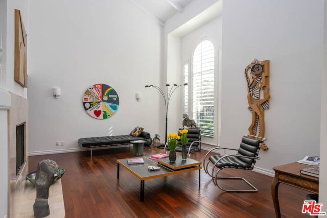 3104 Hutton Drive Beverly Hills, CA 90210 - Photo 5 of 37 a living room with furniture and a wooden floor