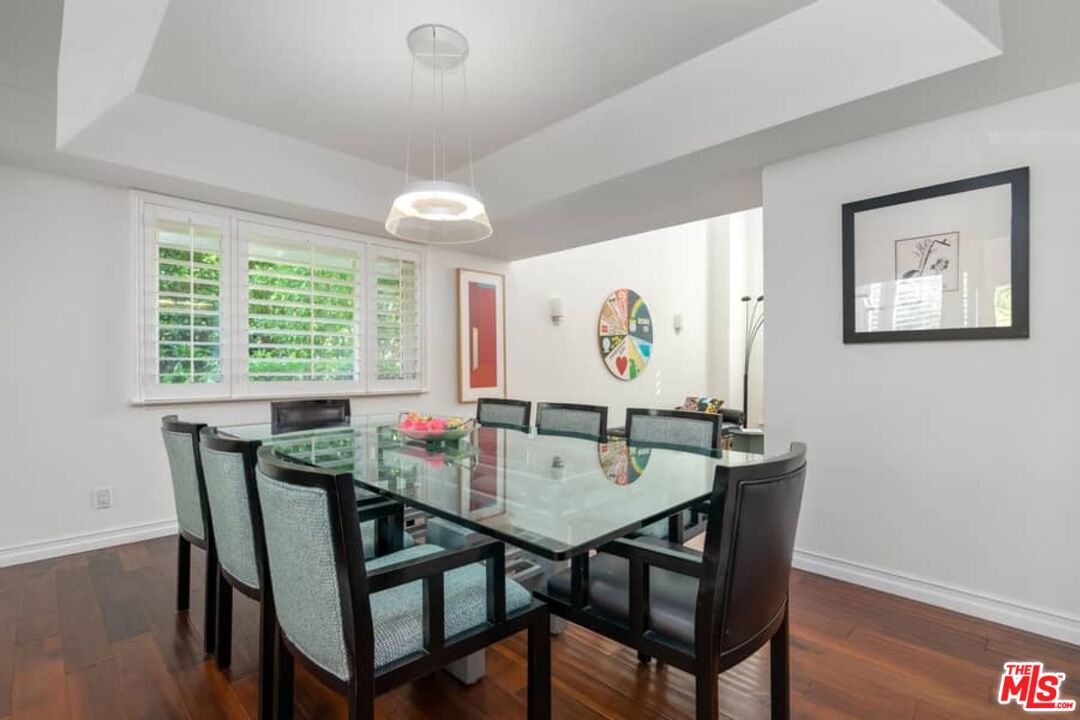 3104 Hutton Drive Beverly Hills, CA 90210 - Photo 8 of 37 a view of a dining room with furniture and wooden floor