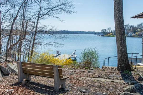 a view of a bench in a backyard