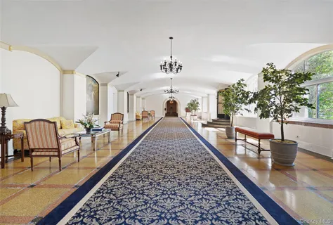 a view of a living room and dining room