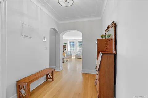 a kitchen with stainless steel appliances a sink stove and cabinets