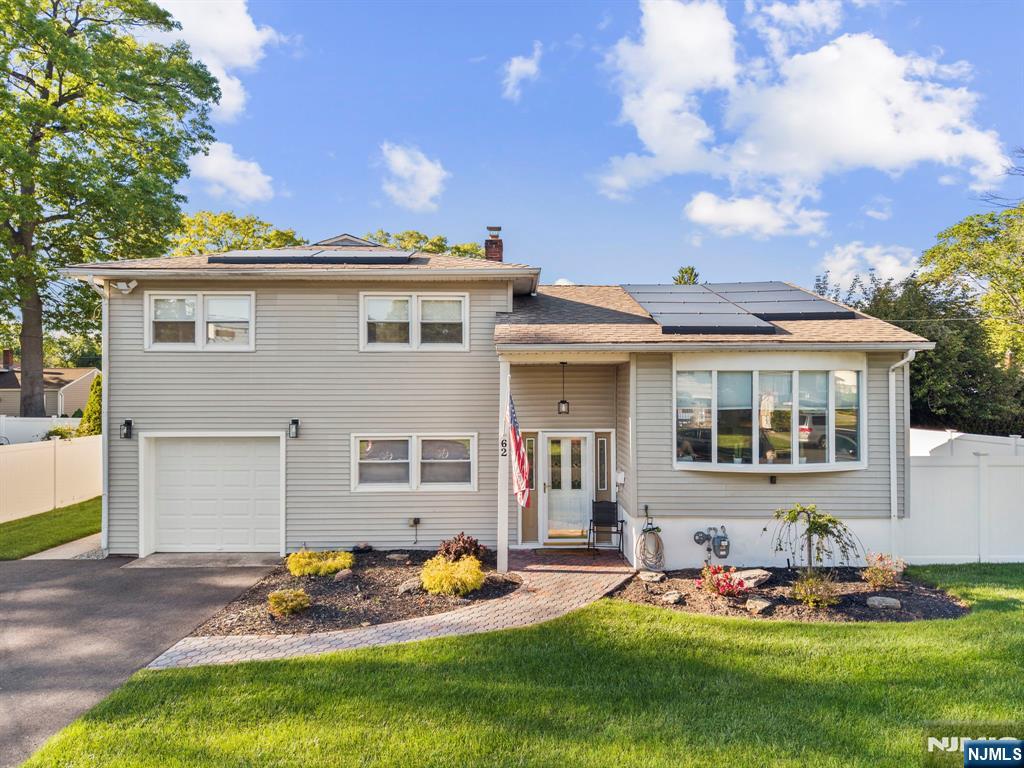 62 Sycamore Road Dumont, NJ 07628 - Photo 40 of 43 front view of a house with a yard