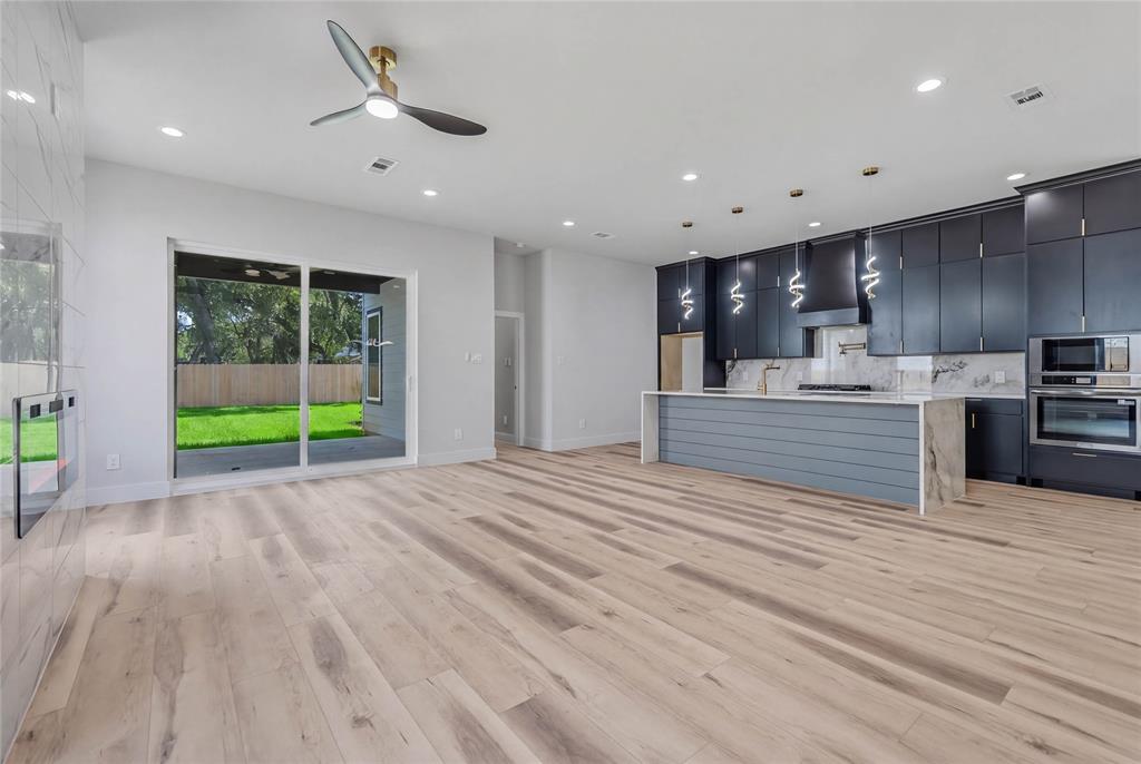 3914 Harlingen Street Dallas, TX 75212 - Photo 5 of 28 a view of a kitchen with a sink and a kitchen view