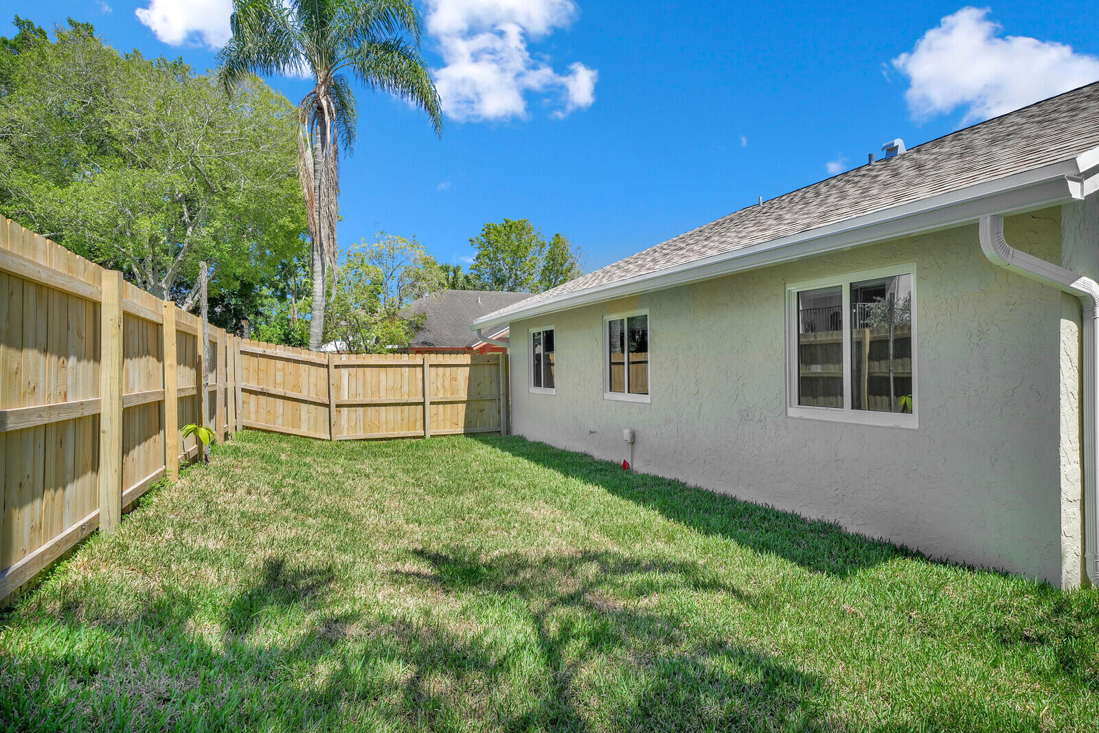 23392 East Country Club Drive East Boca Raton, FL 33428 - Photo 21 of 21 a view of backyard with green space