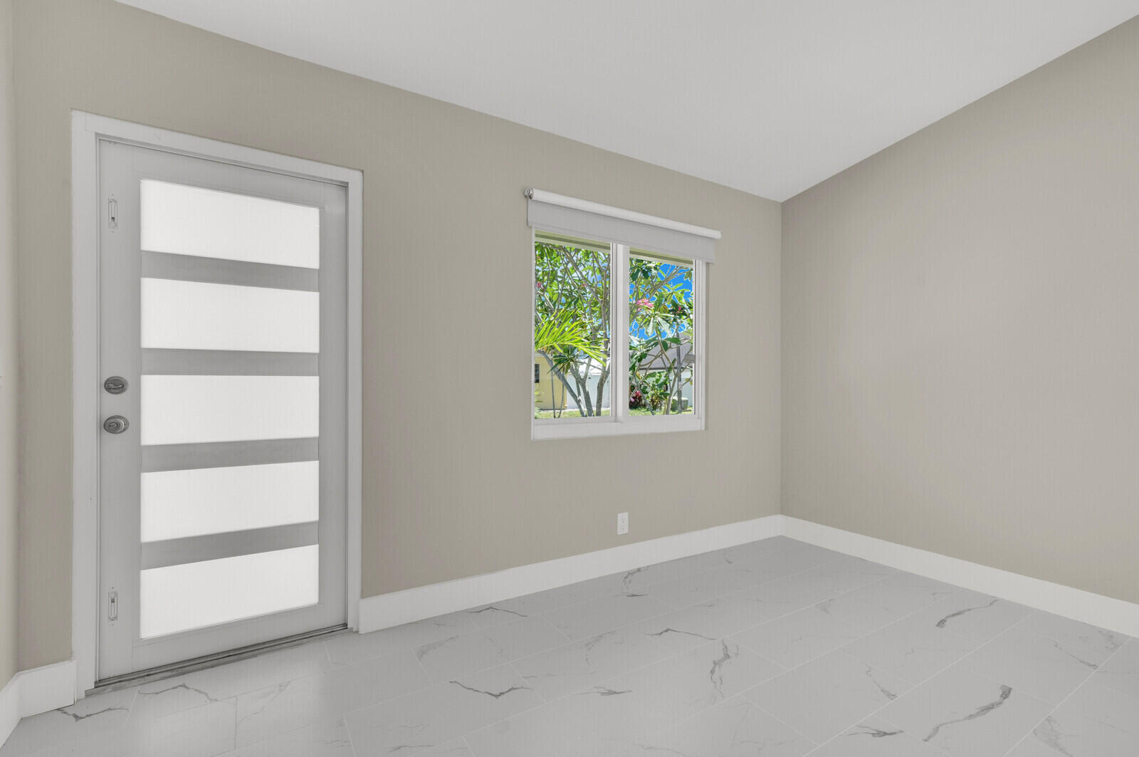 23392 East Country Club Drive East Boca Raton, FL 33428 - Photo 3 of 21 an empty room with a window