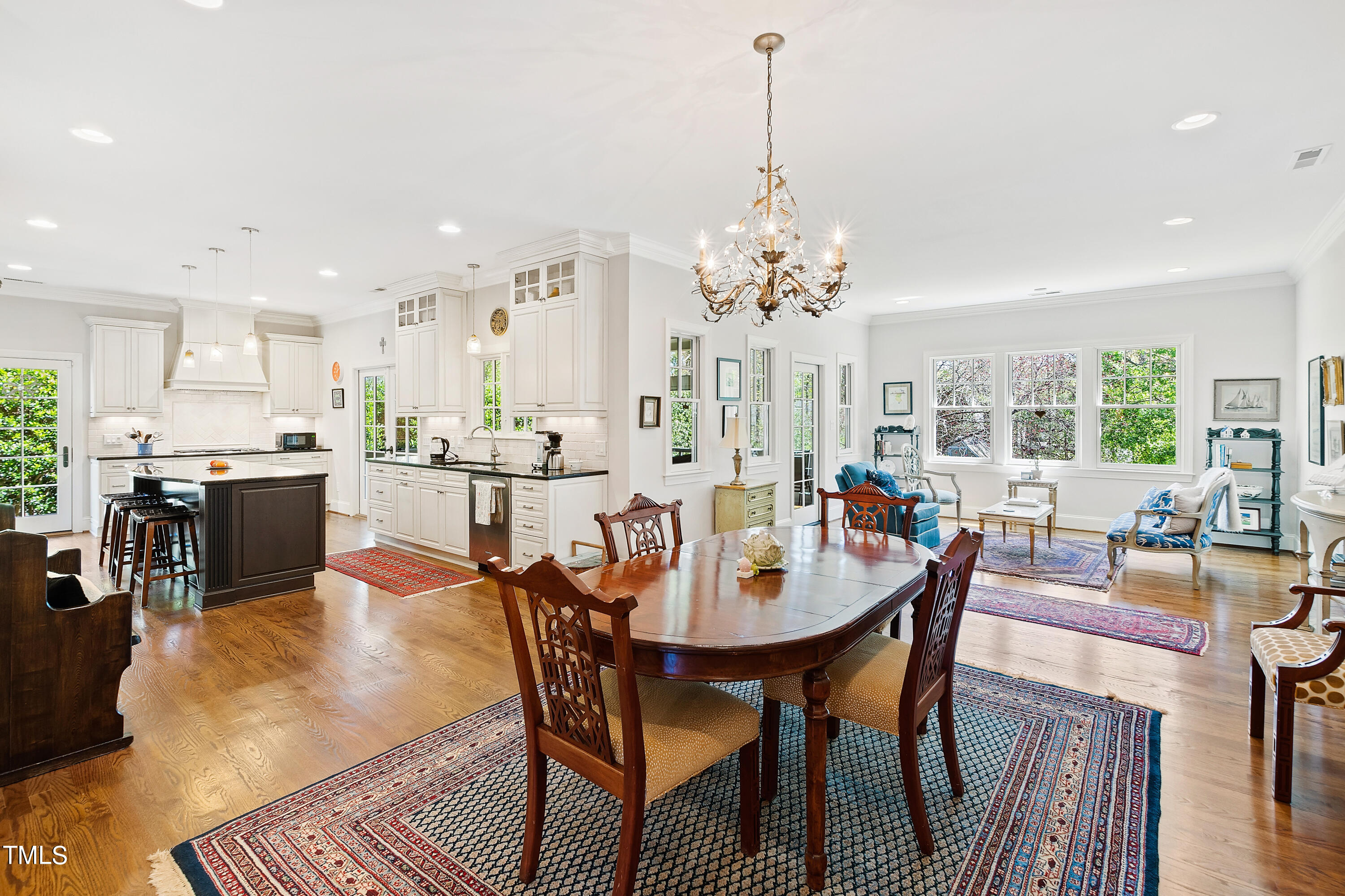 2210 Coley Forest Place Raleigh, NC 27607 - Photo 3 of 44 a view of a dining room with furniture