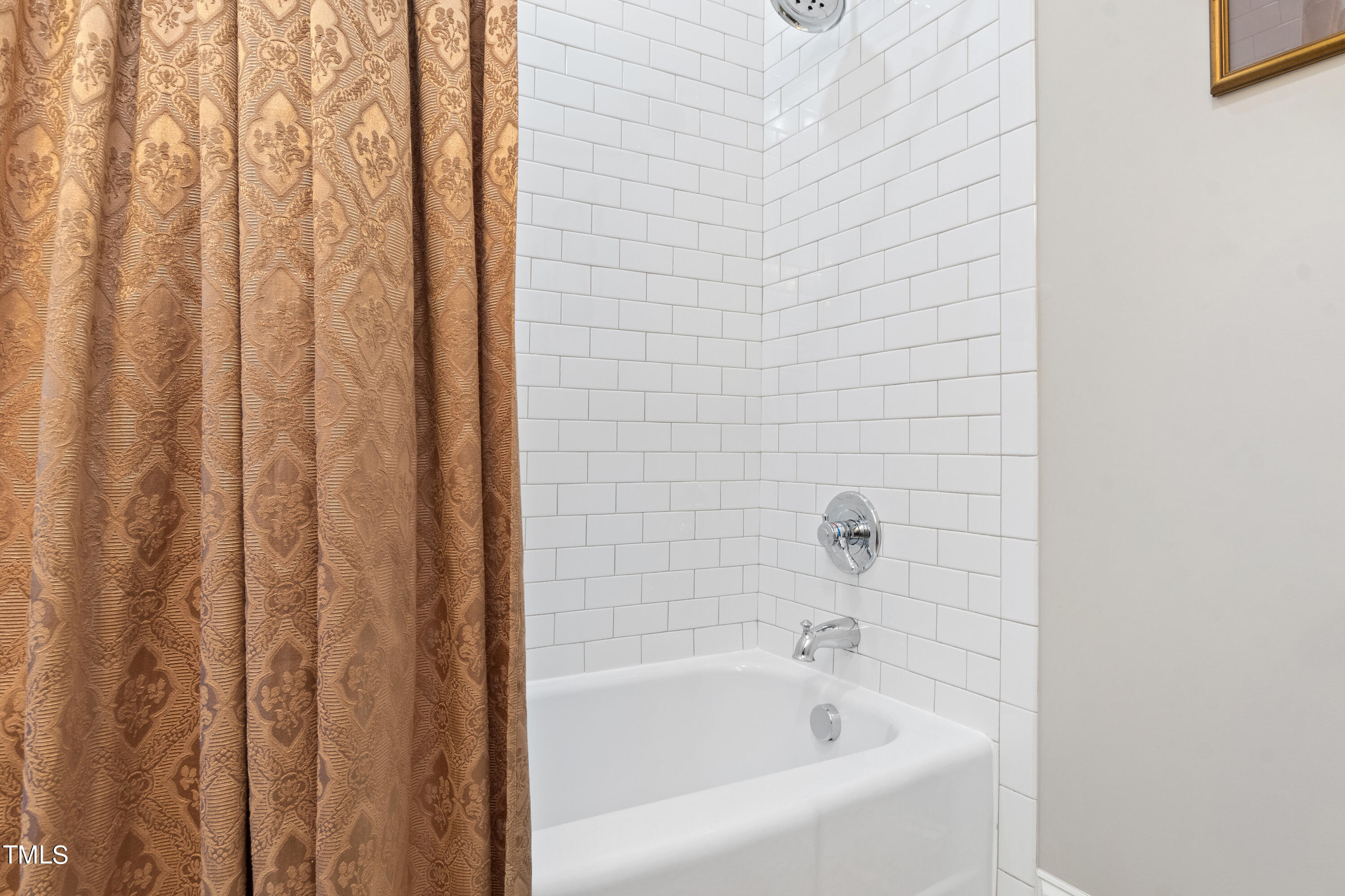 2210 Coley Forest Place Raleigh, NC 27607 - Photo 37 of 44 a bathroom with a bathtub