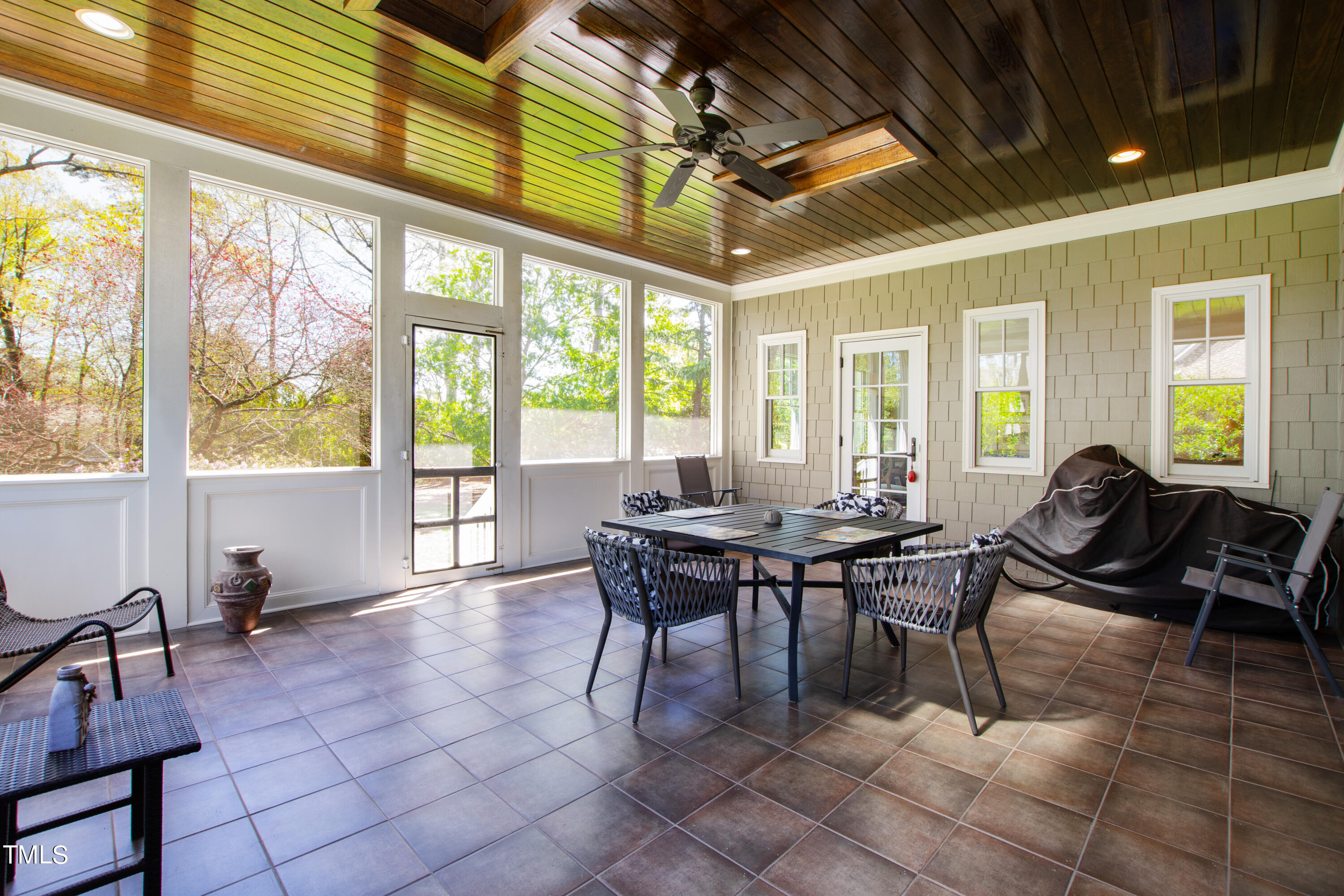 2210 Coley Forest Place Raleigh, NC 27607 - Photo 38 of 44 a view of a dining room with furniture window and outside view