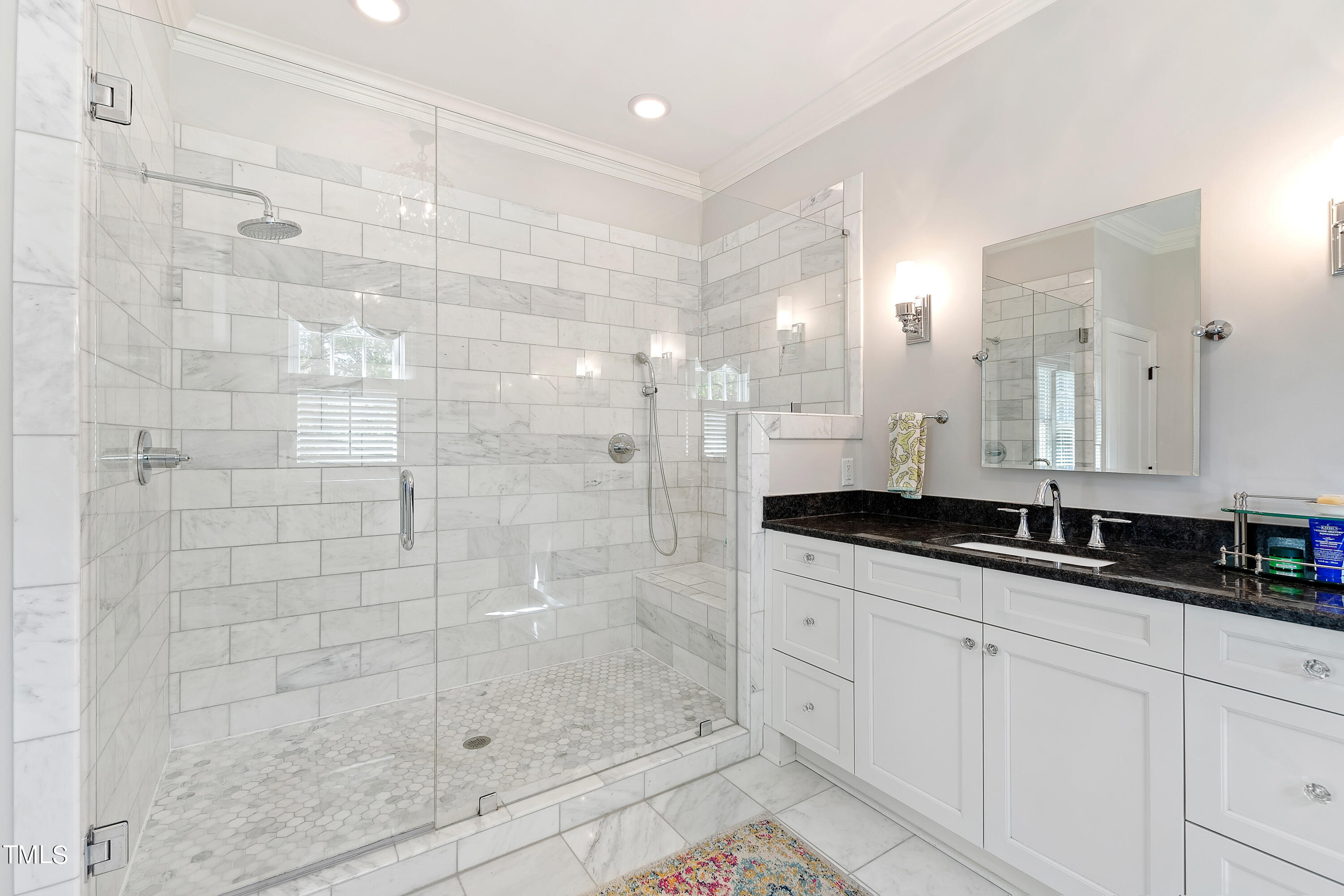 2210 Coley Forest Place Raleigh, NC 27607 - Photo 4 of 44 a bathroom with a granite countertop sink mirror and shower