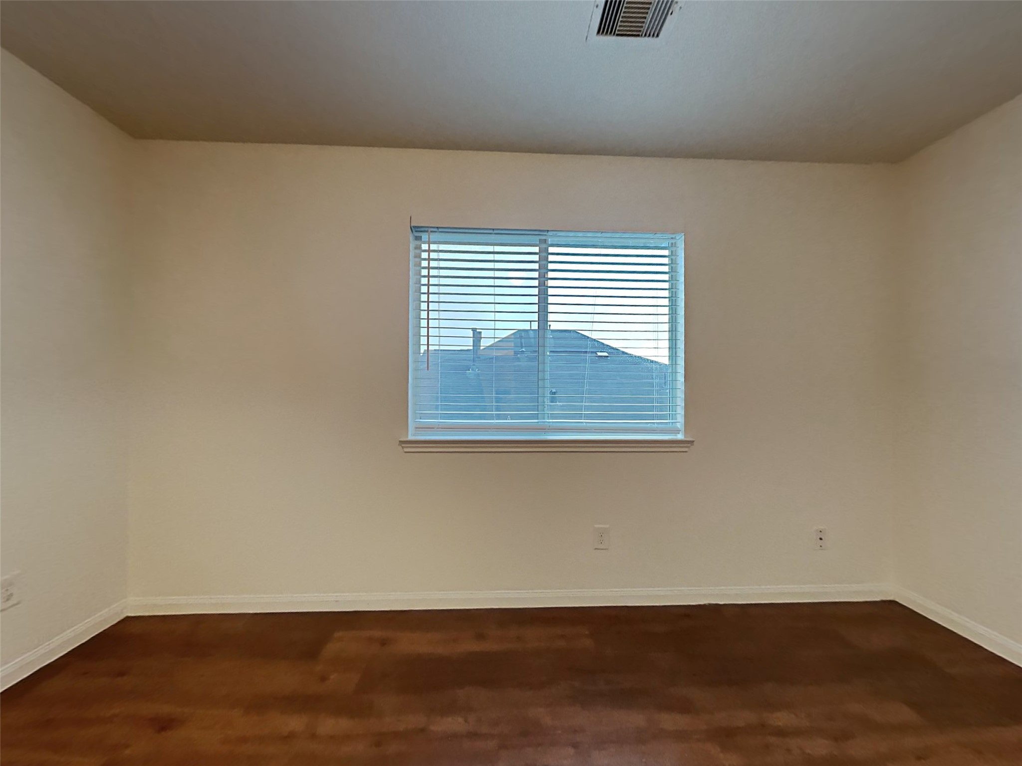 21619 Ornella Circle Humble, TX 77338 - Photo 14 of 18 an empty room with wooden floor and windows