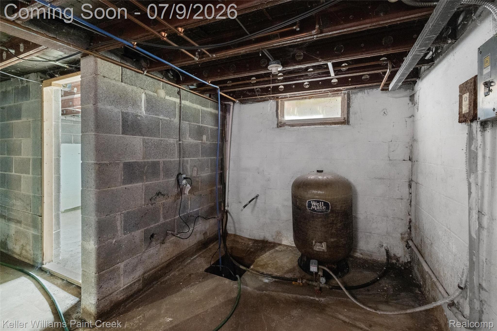 28780 School Section Road Richmond, MI 48062 - Photo 36 of 50 Unfinished basement with exposed ceiling joists and block wall construction