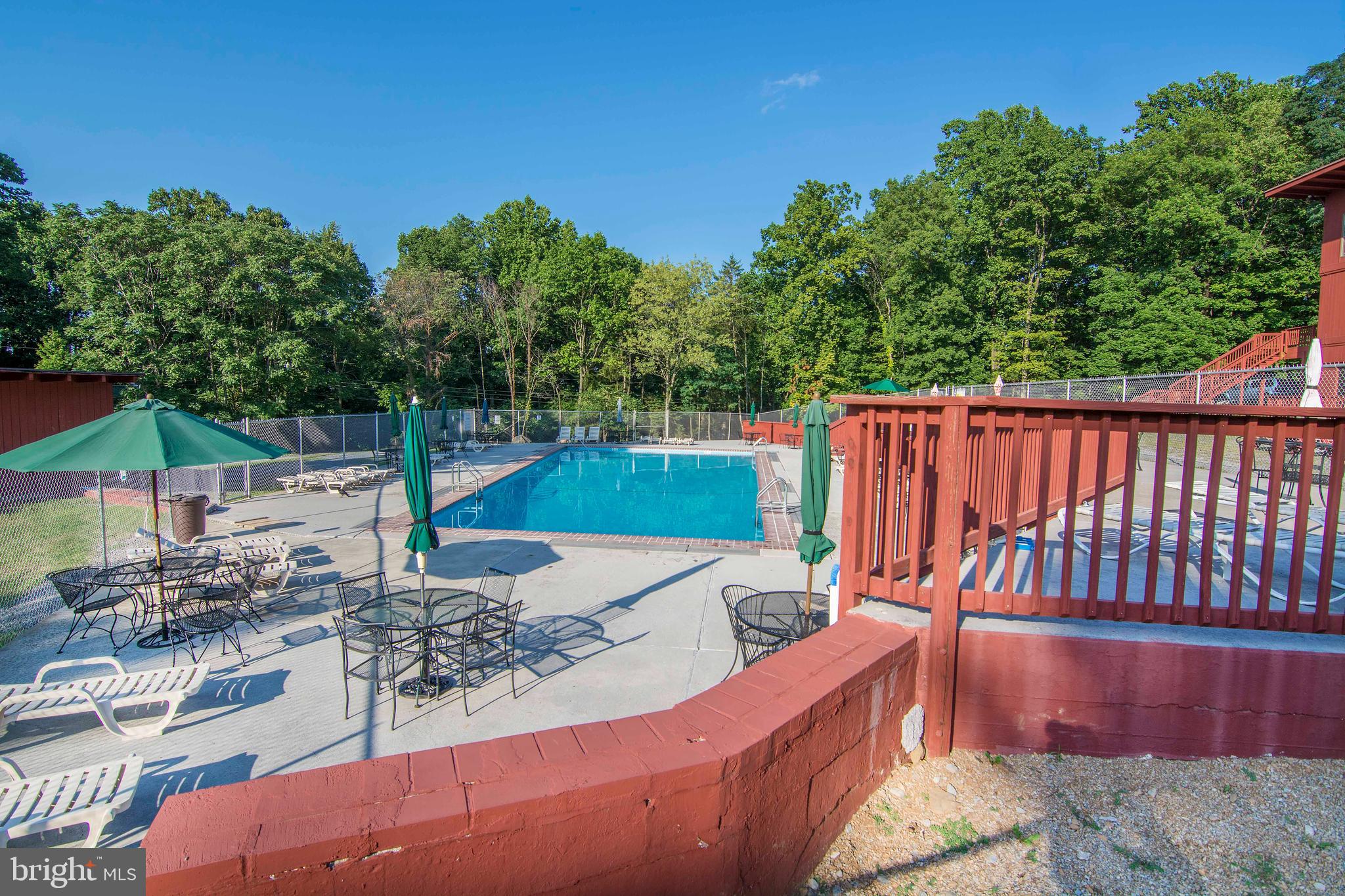 Lot 5 Deer Trail Road Front Royal, VA 22630 - Photo 4 of 6 a view of a backyard with sitting area