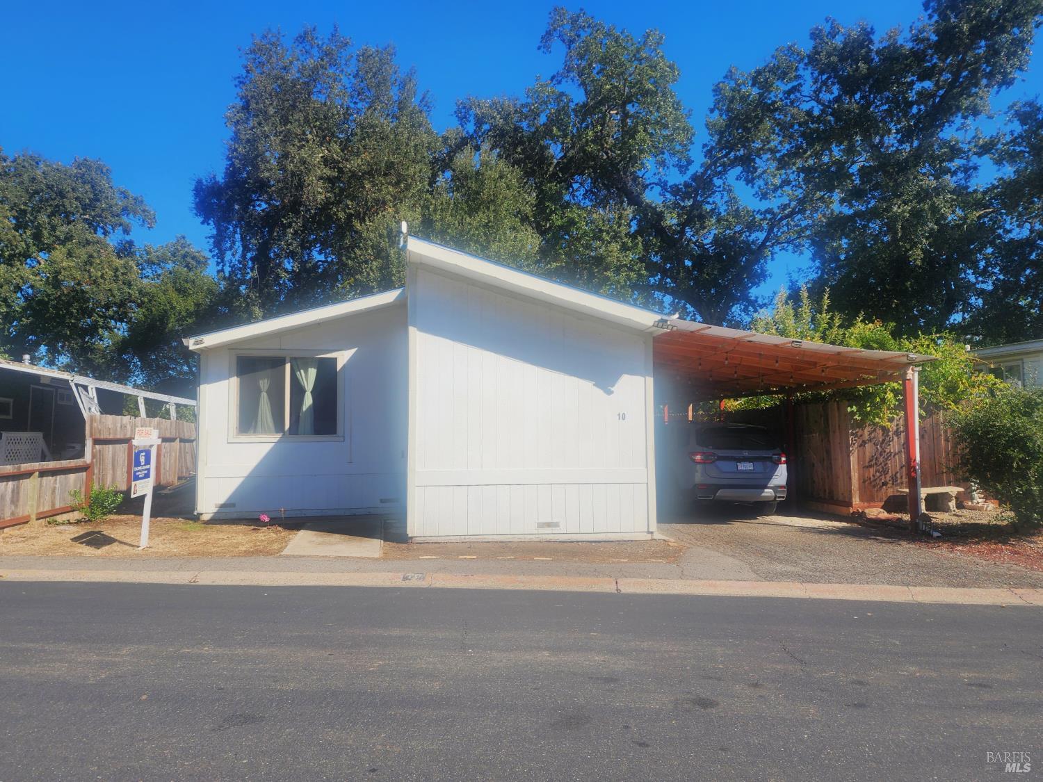 a view of a street with houses