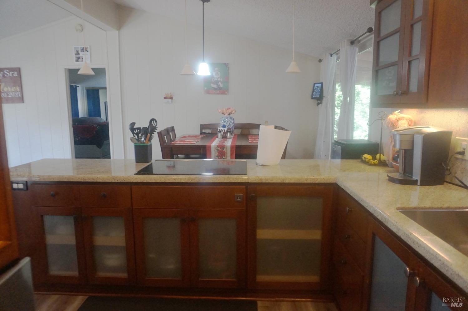 6004 Monticello Road, Unit 10 Napa, CA 94558 - Photo 17 of 41 a kitchen with sink and mirror