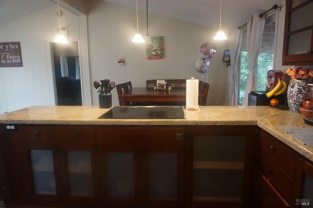a kitchen with a sink and cabinets